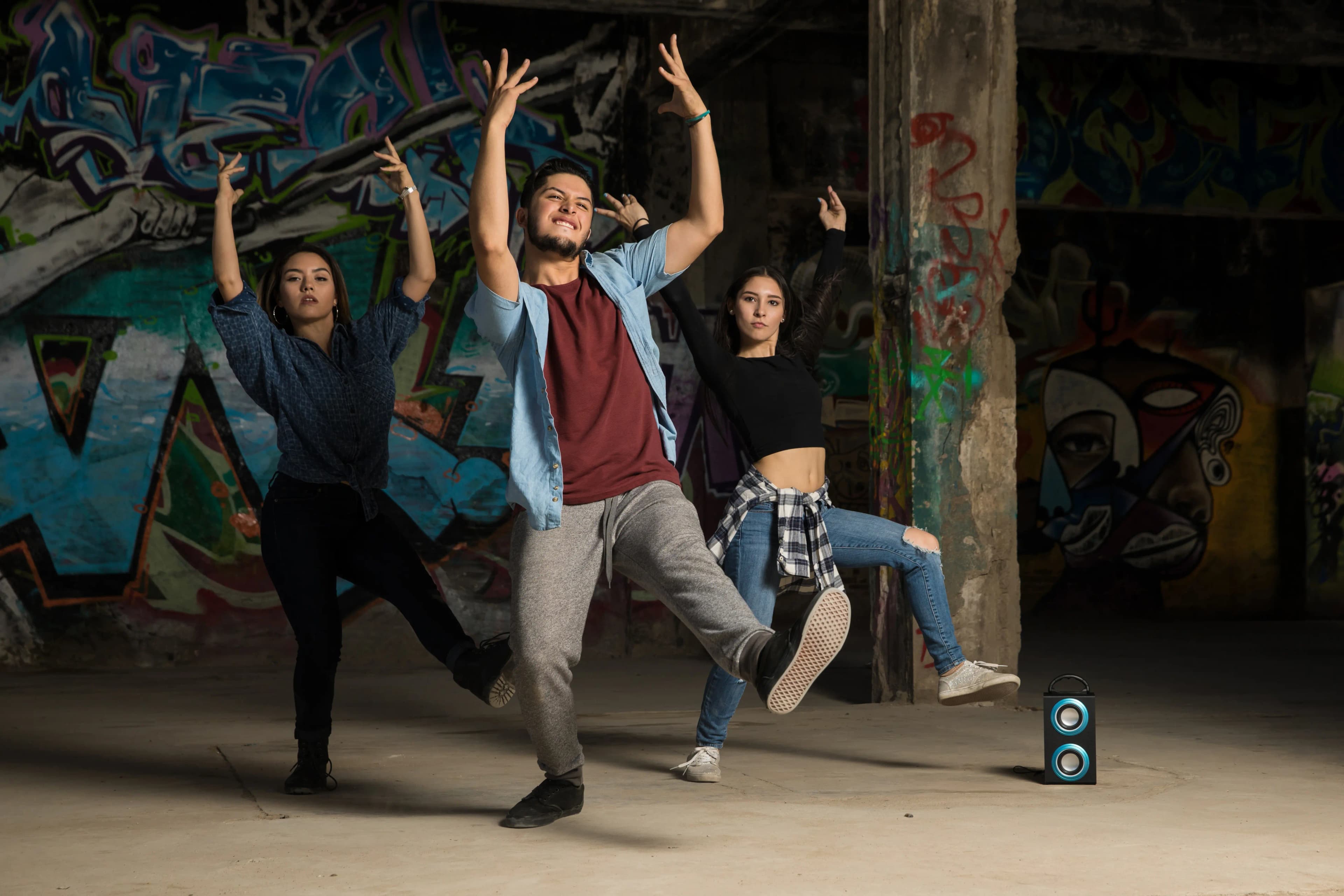 Background: dancers in motion, blurred for effect